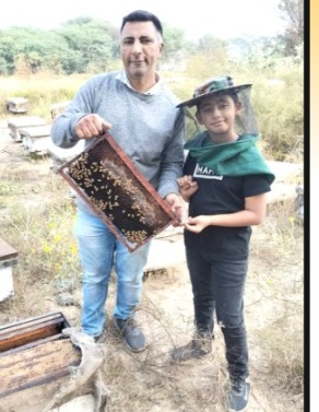 The Bee Group Honey family at the hives